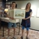 Aquarel Schreierstoren Amsterdam van Tijn Tempelaars overhandigd aan het Anton Pieck Museum